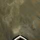 The heavy fuel oil washes up on the shore, while the extensive lighter slick floats up and down the river with the tide.